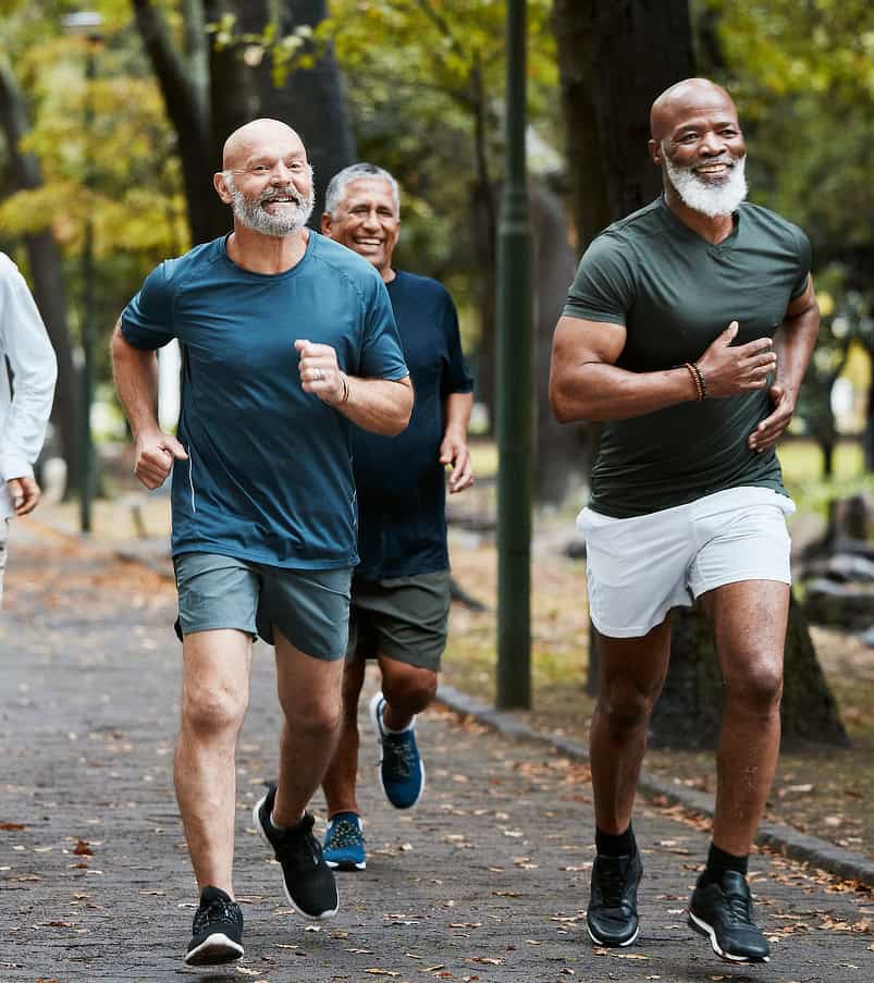 Men running in a park in Milton Keynes